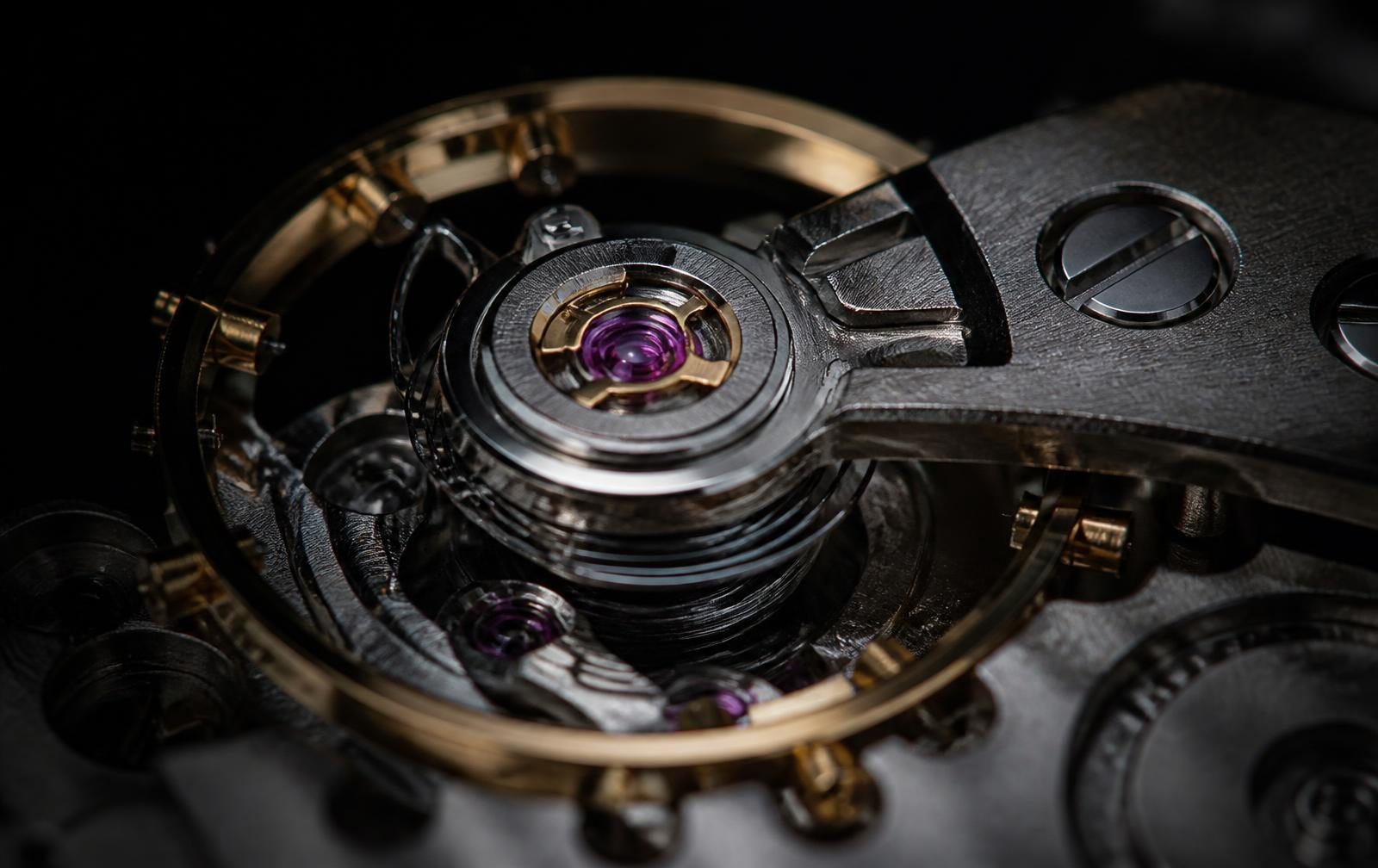 Balance wheel and ruby jewels under raking light